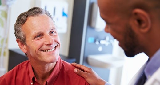 adult-discussing-prevention-with-doctor