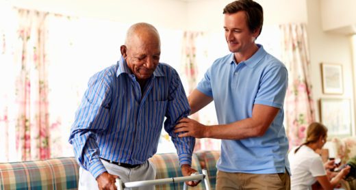 long-term-care-insurance-helping-an-adult-settle-into-a-senior-care-facility