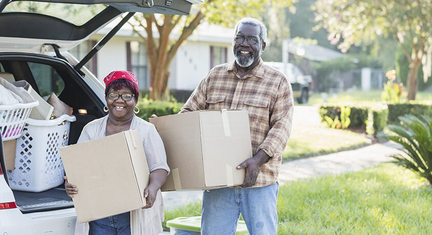 Couple moving boxes