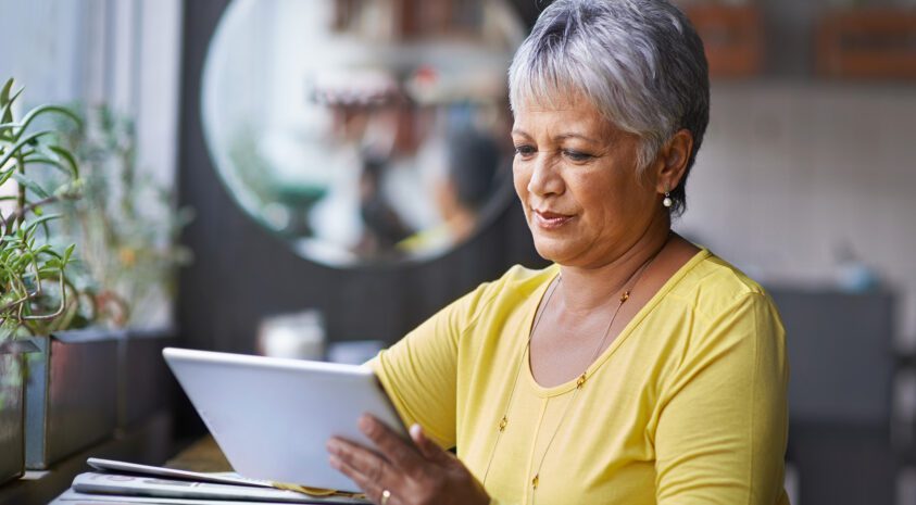 Women reading on iPad