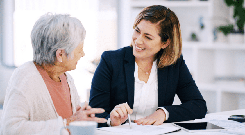 Retiree woman meeting with financial advisor