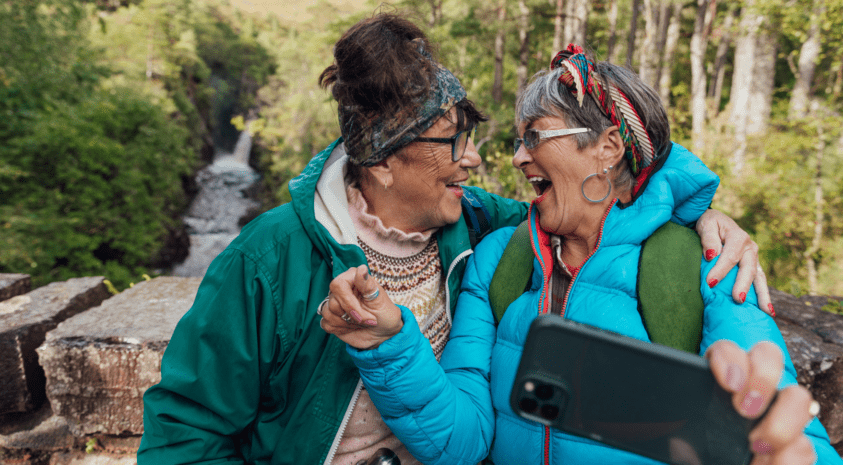 Retired seniors traveling together in nature