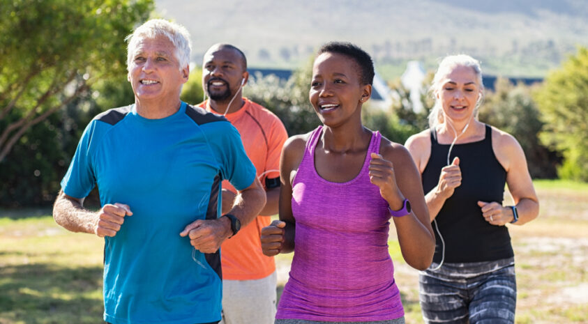 A group of older adults jogging.
