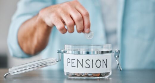 A person adds a coin to a jar labeled "pension."